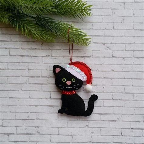 It debuted in japan on the anime satellite television network animax and the terrestrial tokyo broadcasting system network on october. Black cat Black Felt Cat Christmas Decoration Christmas ...