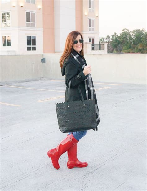 Raincoat And Rain Boots Thoughtfully Styled