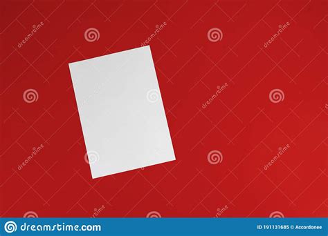 A Blank Empty White Paper Sheet Of A4 Format On The Table In Office