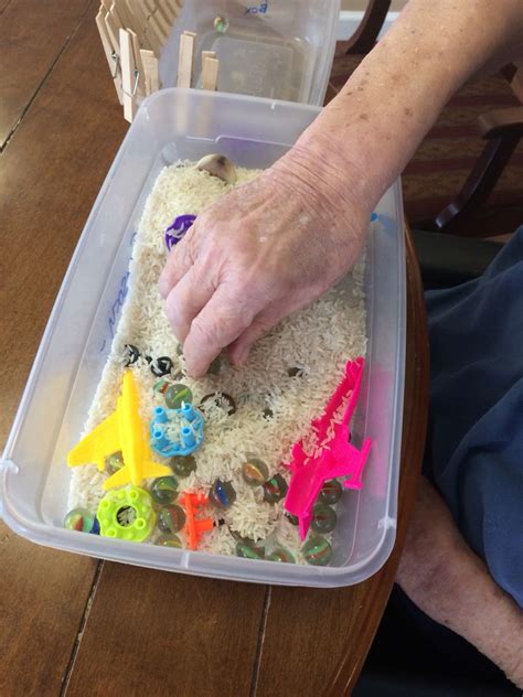 While games also provide cognitive stimulation, improve processing and motor skills, and increase logic and reasoning, they can also simply be a source of enjoyment for all involved in playing them. Sensory box - find the pieces #dementia (With images ...