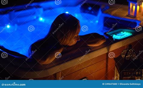 Night Scene A Young Woman Relaxes In The Hot Tub On A Rooftop Stock Footage Video Of Resort