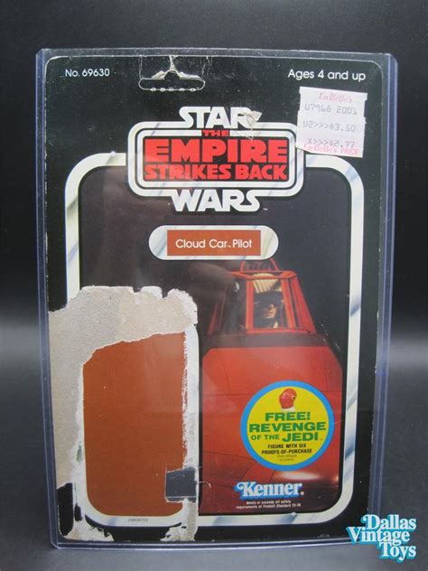 One of the best things you can do with your double backer cards is to design your own routines and effects. 1983 Kenner Star Wars ESB 48 Back Cloud Car Pilot Backer Card with Sleeve (SWBC517)