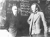 Max Planck (r) and Niels Bohr in front of Maxwell's equations | Niels ...