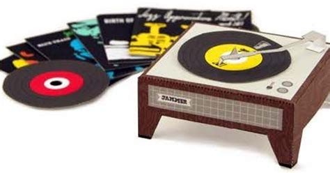 Here Is A Miniature Paper Model Of A Record Player With Some Old Vinyl