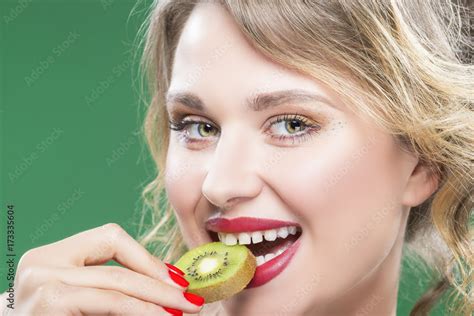 Fruit Kiwi Series Closeup Of Sensual And Sexy Naked Caucasian Model With Teeth Diastema Posing