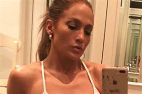Jennifer Lopez Jlo Exposes Assets In Paper Thin Sports Bra On