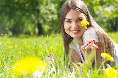 Woman Laying On Grass In Park Stock Image Image Of Caucasian Brunette 142252549