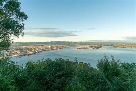 Tauranga Harbour And The Port Wharves With Distant Hills Stock Image