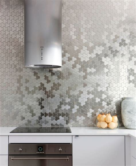 The hems will add a degree of rigidity to the backsplash. Kitchen Design Idea - Install A Stainless Steel Backsplash ...