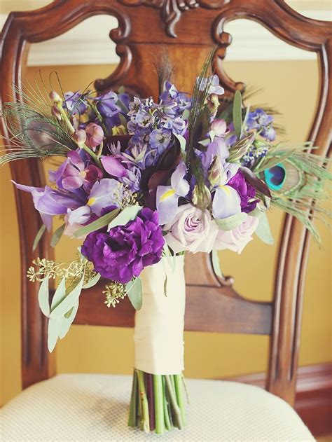 Purple Wedding Bouquet With Irises Roses Orchids And Delphiniums