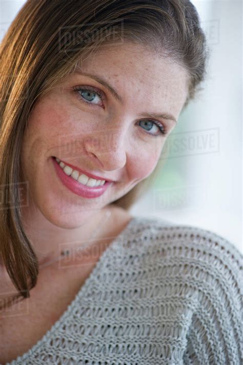 Portrait Of Smiling Woman Stock Photo Dissolve