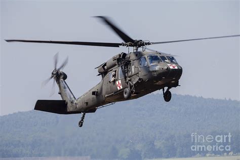 Uh 60a Black Hawk Medevac Helicopter Photograph By Timm Ziegenthaler