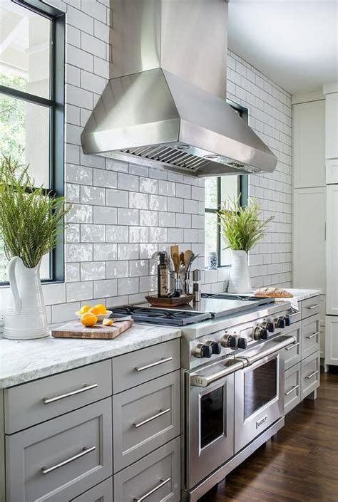 Maybe you would like to learn more about one of these? White glazed kitchen tiles with gray grout | Kitchens ...