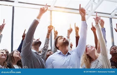 Group Of Diverse Young People Holding Their Hands Up Stock Image