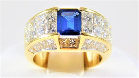 Emerald Cut Sapphire And Rare Quadrillion Cut Diamonds Gold Ring At