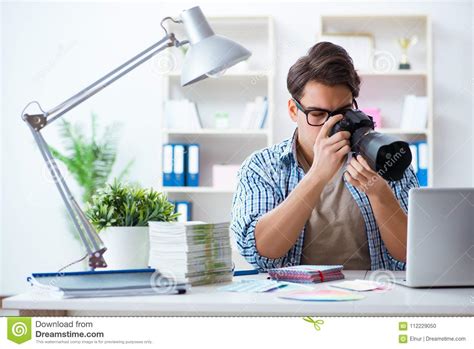 The Young Photographer Working With His Camera Stock Photo Image Of