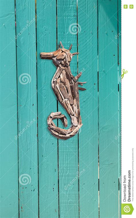 Wood Driftwood Seahorse Decor On An Aqua Blue Stock Photo