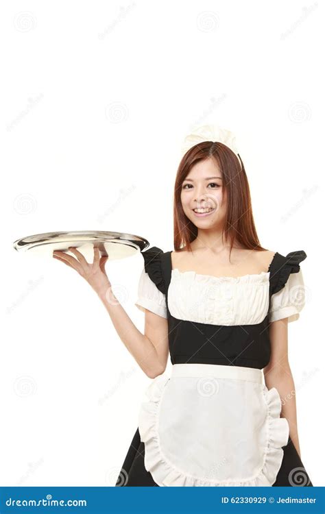 Young Japanese Woman Wearing French Maid Costume With Tray Stock Image