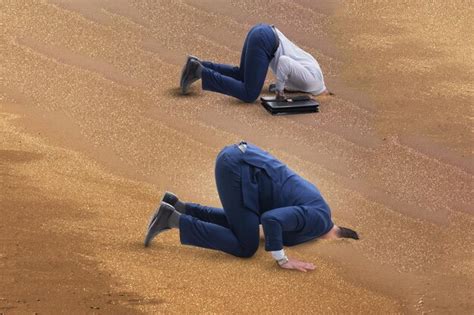 Premium Photo Businessman Hiding His Head In Sand Escaping From Problems
