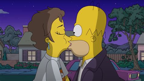 olivia colman steals a kiss from homer in exclusive simpsons clip