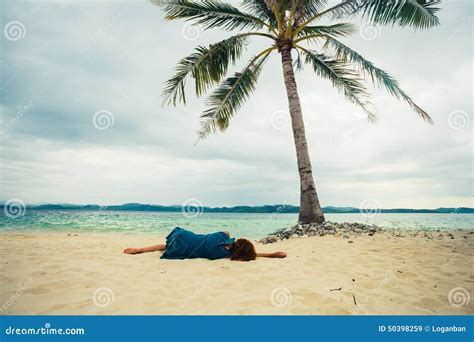 Young Woman Lying Under Palm Tree On Beach Stock Image Image Of