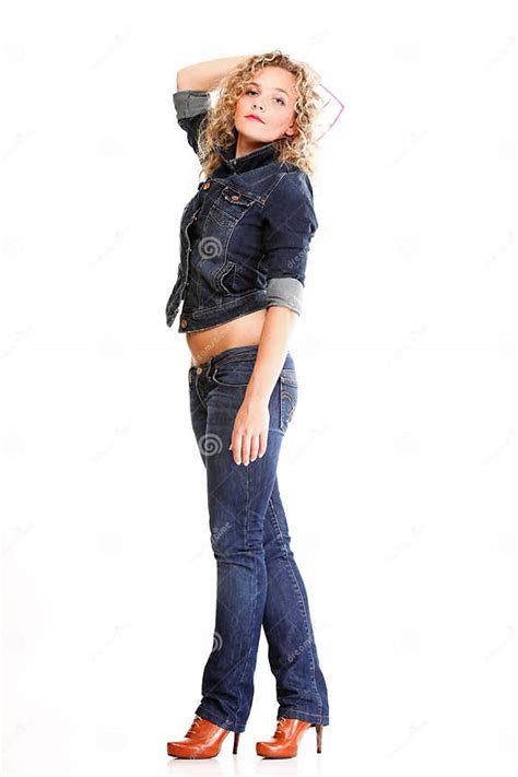 Beautiful Young Woman Blonde Standing Full Body In Jeans Isolate Stock