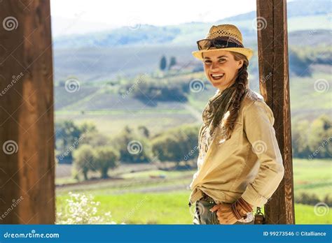 Smiling Adventure Woman Hiker In Hat Hiking In Tuscany Stock Photo