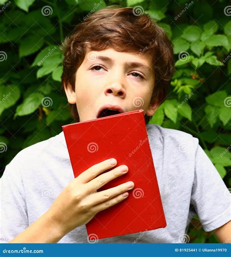 Yawning Teen Boy With Book Stock Image Image Of Modern 81925441