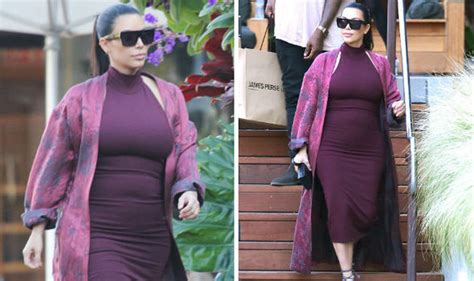 Kim Kardashian Pregnant Squeezes Growing Bump Into Skintight Dress Celebrity News Showbiz