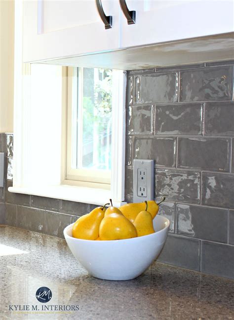 But don't ruin your sink's finish or clog your drains. Glazed shiny gray subway tile in kitchen remodel with quartz countertops and white painted ...