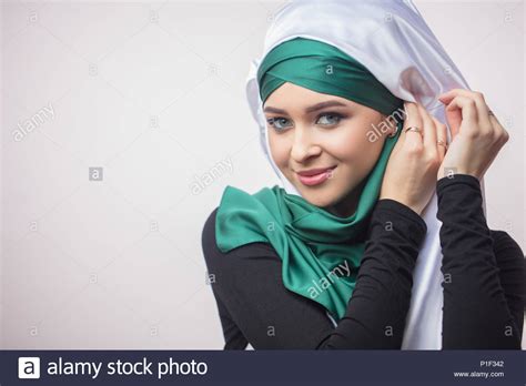 Close Up Portrait Od Beautiful Muslim Girl Showing How To Tie A