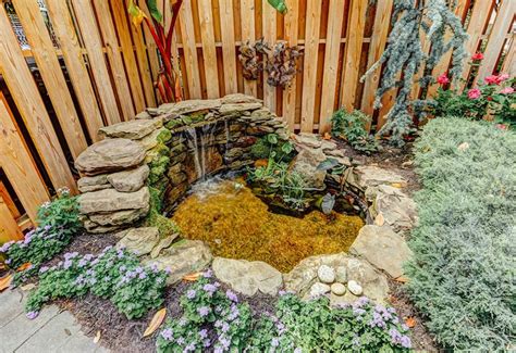 Ponds come in a variety of shapes would you rather mow grass, or spend time relishing the serenity of this backyard oasis? 53 Backyard Garden Waterfalls (Pictures of Designs ...