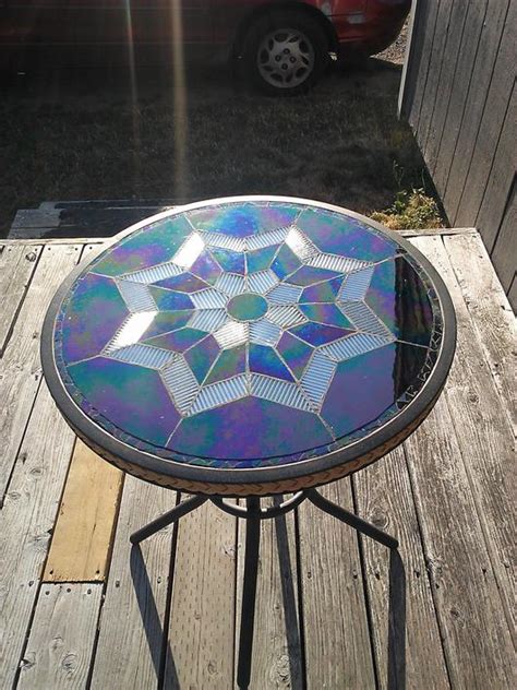 Solid oak legs with a walnut stain. Stained Glass Mosaic Table - Delphi Artist Gallery