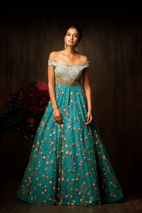 A Truly Magnificent Pagoda Blue Gown With An Off Shoulder Bodice Which Is Entirely Done In Res