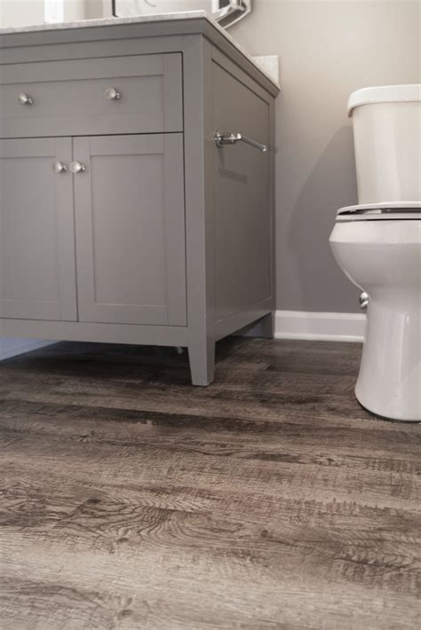 Loving This Lvt Flooring In Our Clients New Basement Bathroom