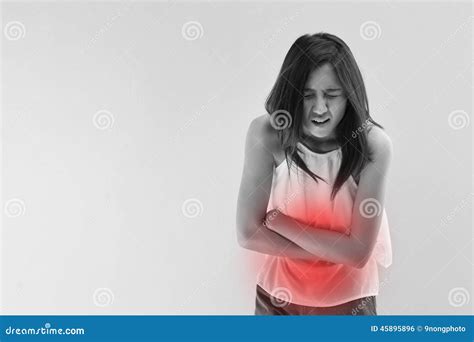 Menstruation Pain Or Stomach Ache Hand Holding Belly Stock Photography