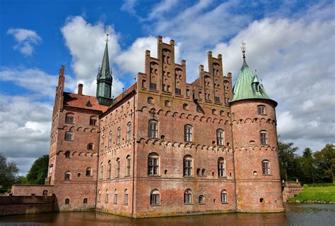 Danmark), officially named the kingdom of denmark, is a nordic country in northern europe. Egeskov Castle, Denmark Travel Guide - Encircle Photos