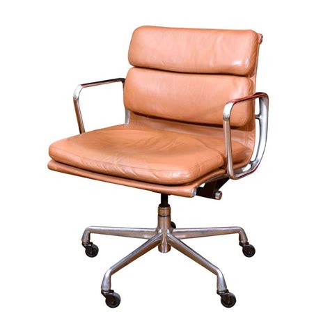 An extension of the aluminum group chairs designed in 1958 for the irwin miller home, the soft pad group repeats the structure of the earlier chairs, adding cushions to the seat and back. Charles Eames leather soft pad desk chair at 1stdibs