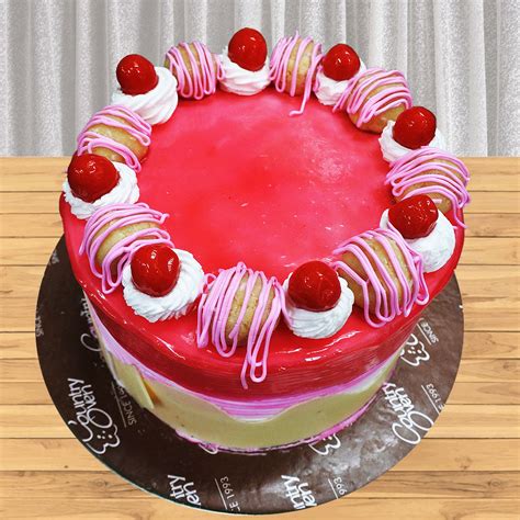Each gift, flower bud, and bite of yummy cake will help them remember you. Send Red Glaze Strawberry Cake Gifts To hyderabad
