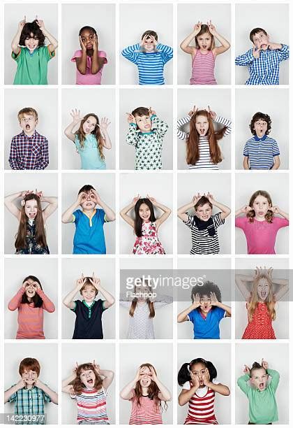 Boys 7 9 Pulling Funny Faces Photos Et Images De Collection Getty Images