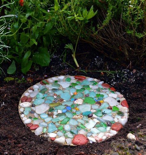 Diy stepping stones will serve as a great decorative and functional piece for your garden, as well as a brilliant craft option for you and your kids. DIY Sea Glass Stepping Stone • Lovely Greens