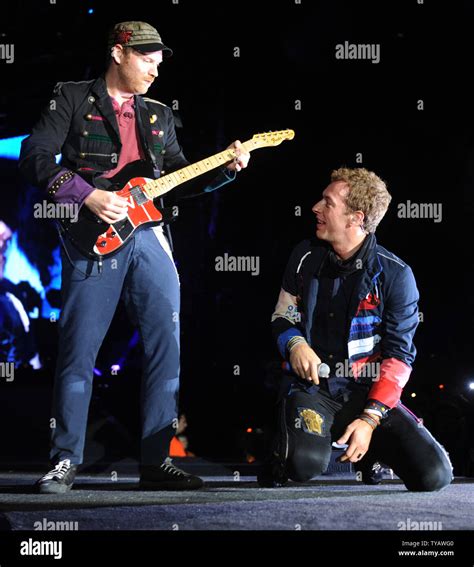 British Singer Chris Martin And Guitarist Jonny Buckland Perform With