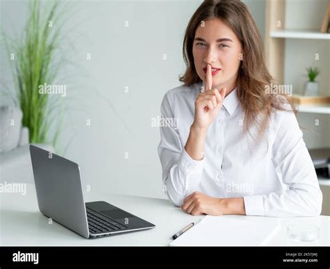 quiet work silence woman secret information pretty Stock Photo - Alamy