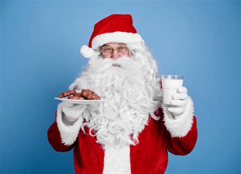 Santa Eating Stock Photos Pictures And Royalty Free Images Istock