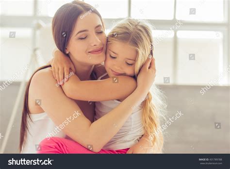 Beautiful Young Mother Her Daughter Hugging Stock Photo 431789788