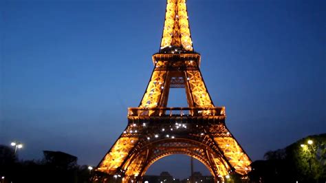 La Torre Eiffel Iluminada Por La Noche Youtube