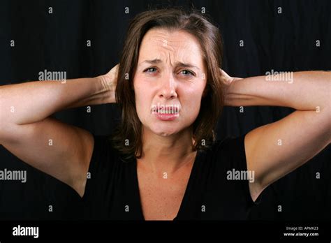 Young Brunette Woman With Shocked Terror Stricken Disbelieving