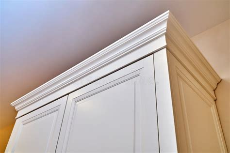 Classic Wardrobe Wardrobe With Crown Molding Fragment Of The Upper Part Of The Cabinet Stock