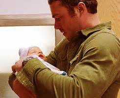 When He Held A Baby Hot Pictures Of Taylor Kinney On Chicago Fire Popsugar Entertainment Photo