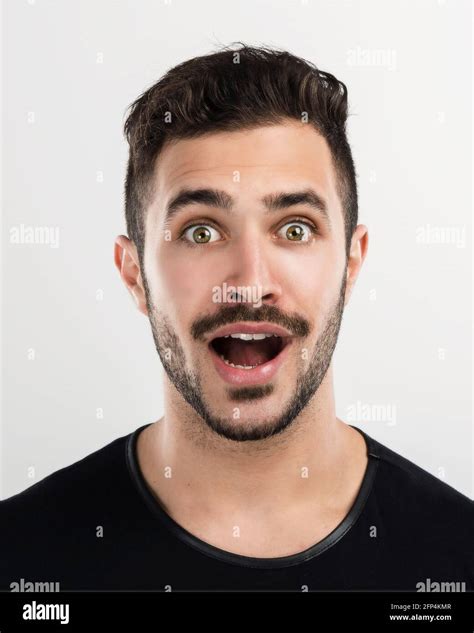 Young Man With A Astonished Expression Stock Photo Alamy